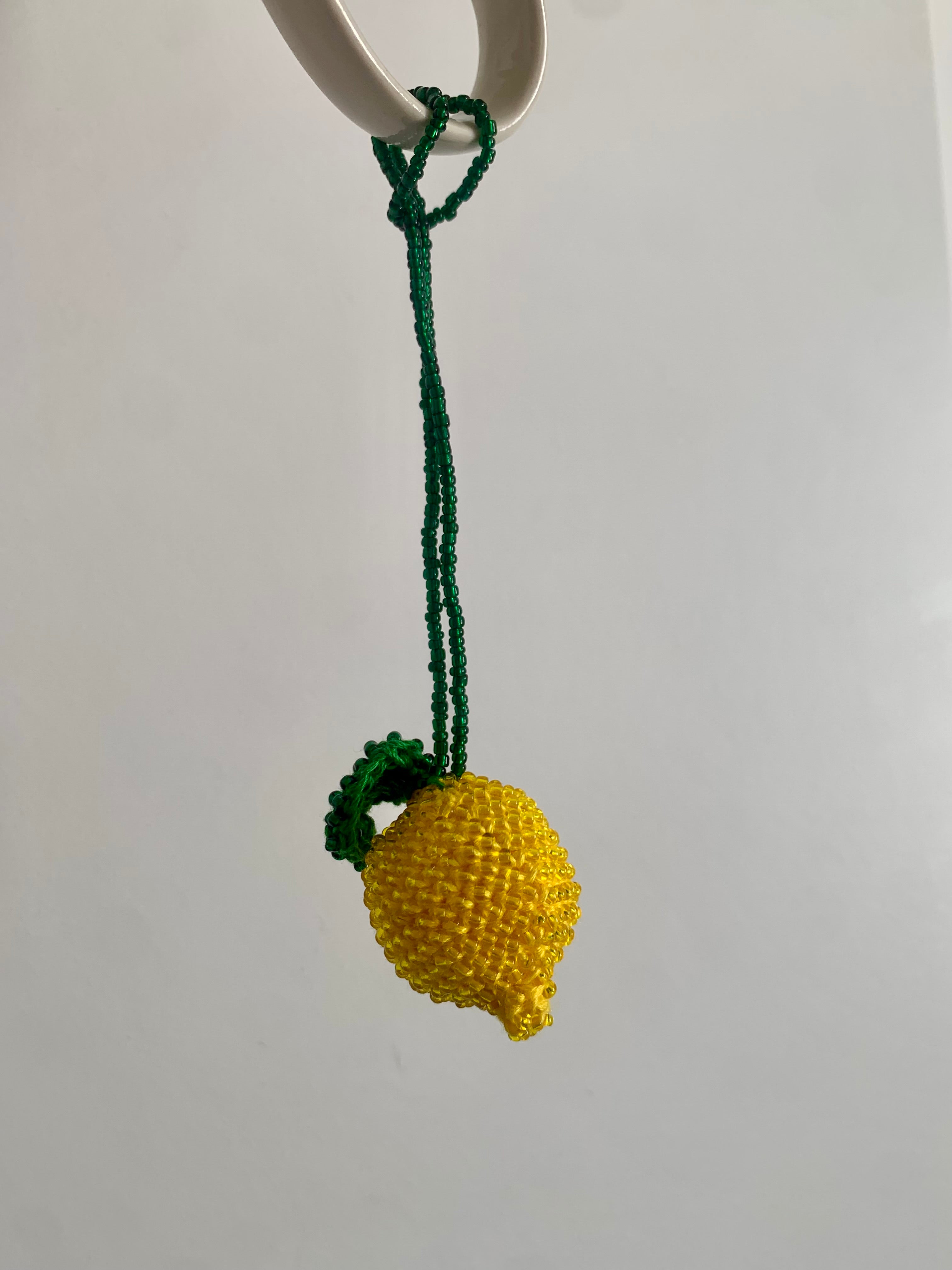 Amuleto de bolso limón — Ácido